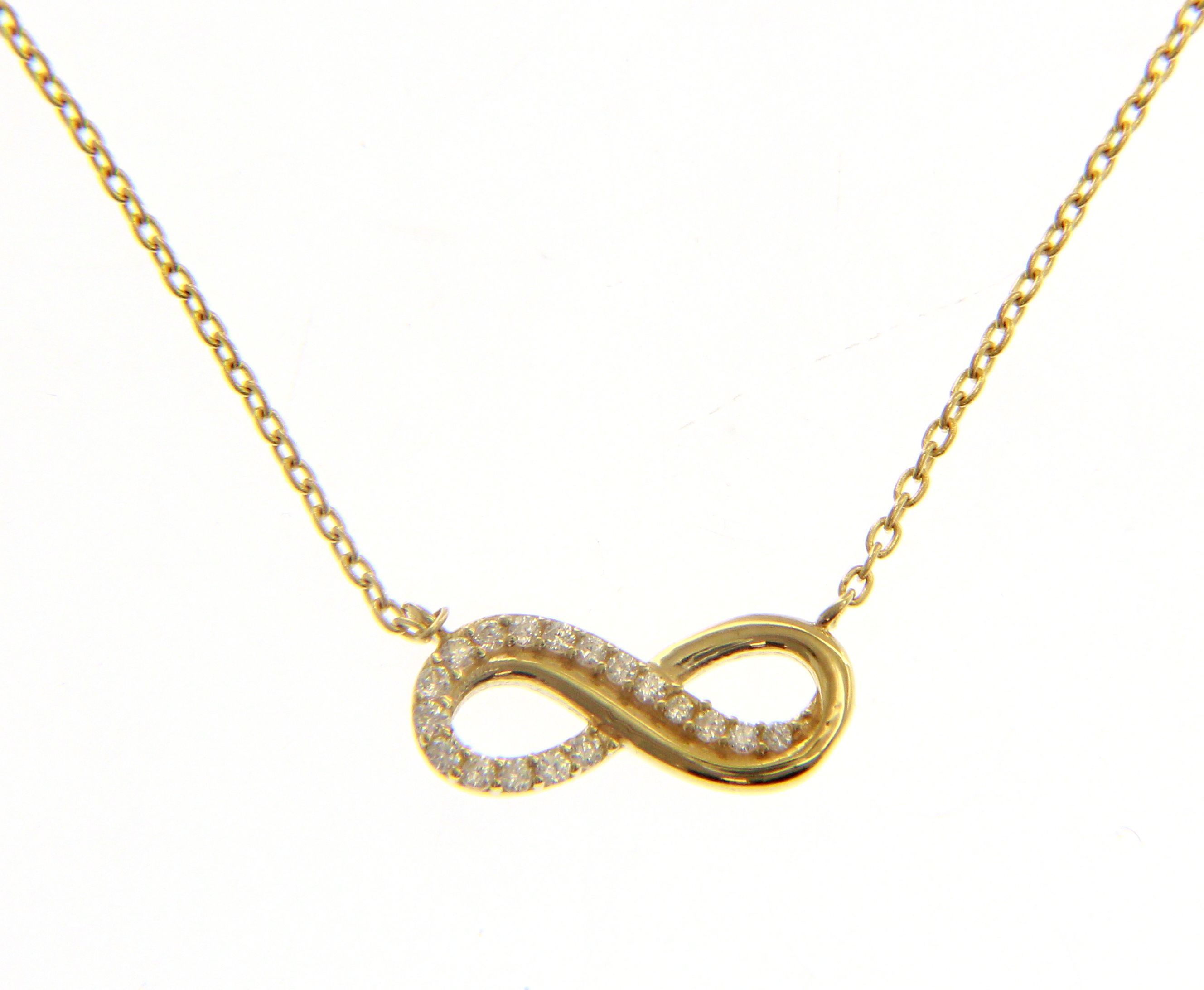 Golden infinity symbol necklace k9 with white zircon (code S218520)